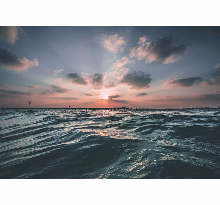 Fotobehang zee zonsondergang boven de golven - TenStickers