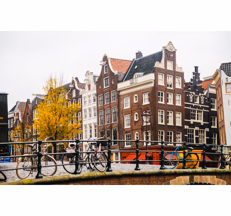 Amsterdamse fotobehang fietsen en grachtenpand - TenStickers