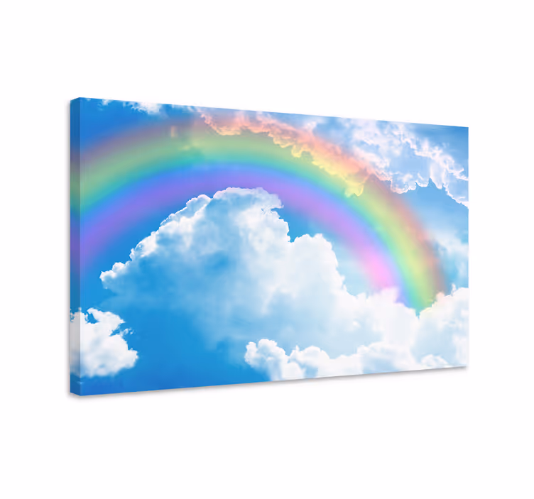 Blauw canvas schilderij regenboog op blauwe lucht met wolken - TenStickers