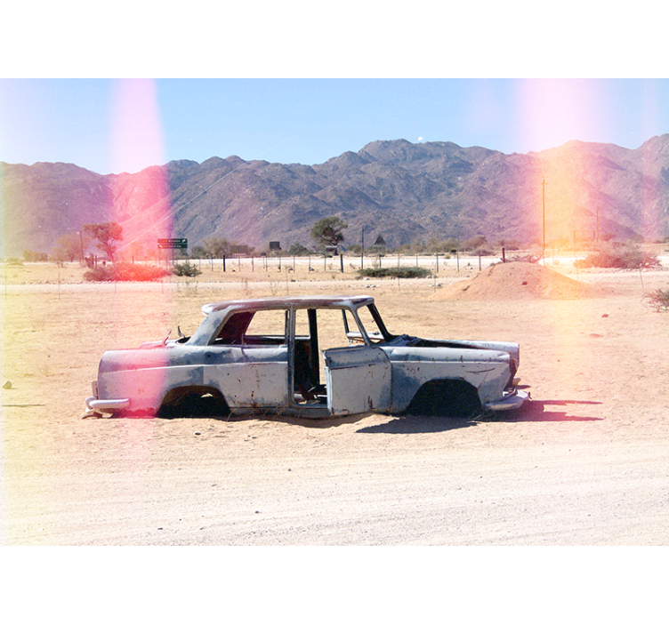 Rolgordijn woonkamer verlaten auto in de woestijn - TenStickers