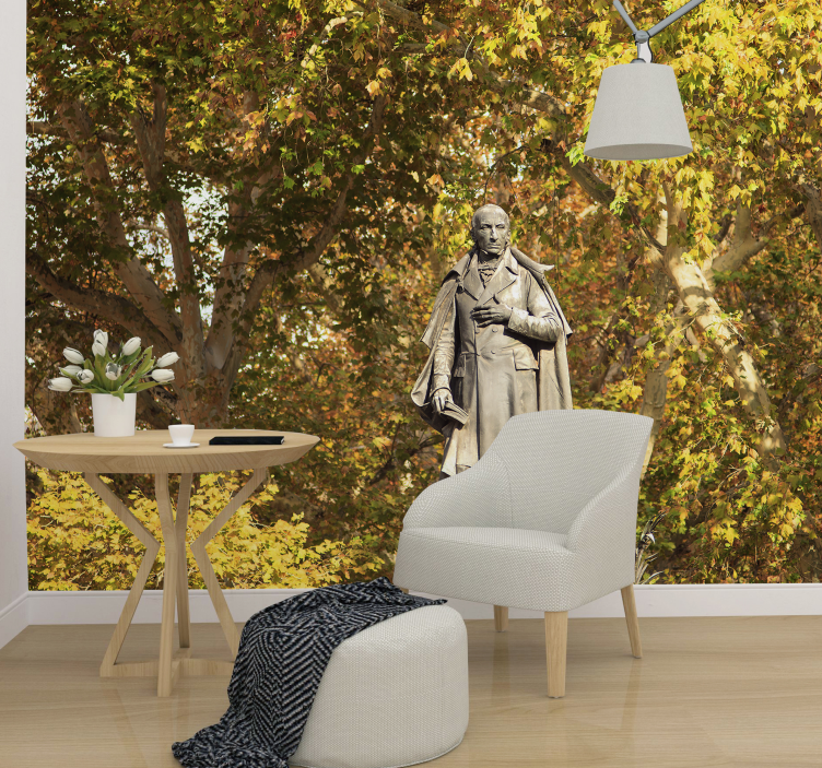 Standbeeld tussen het gebladerte fotobehang mensen - TenStickers