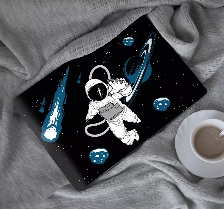 Laptop sticker astronaut in de zwevende kosmos - TenStickers