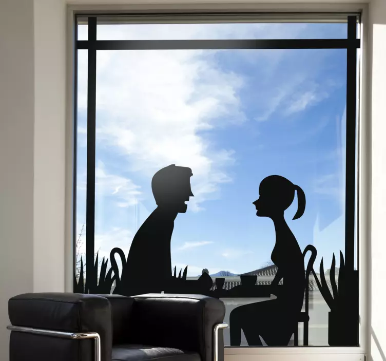 Sticker raam silhouette stel aan tafel - TenStickers