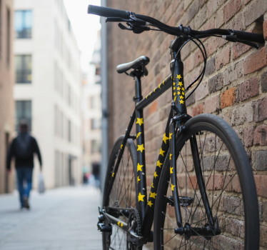 Fiets sticker gele ster bliksem graphics - TenStickers