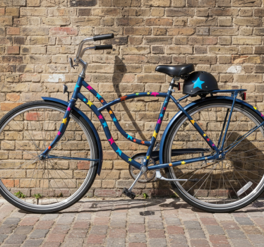 Fiets sticker kleurrijke sterren in verschillende maten - TenStickers