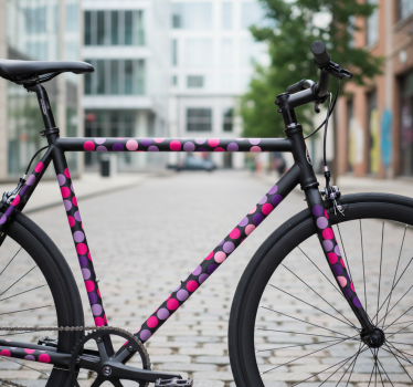 Fiets sticker paarse en roze stippen - TenStickers