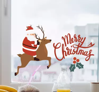 Kerst sticker kerstman op een rendier - TenStickers
